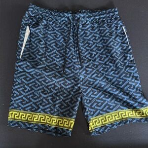 Geometric Logo Print Athletic Shorts with Yellow Accent